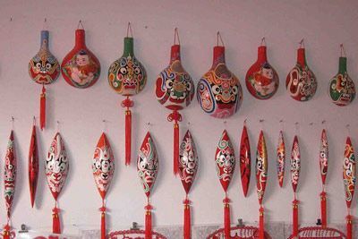 历史文化背景下的木马勺艺术：木马勺脸谱